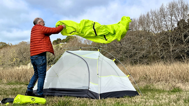 pitching tent in the wind