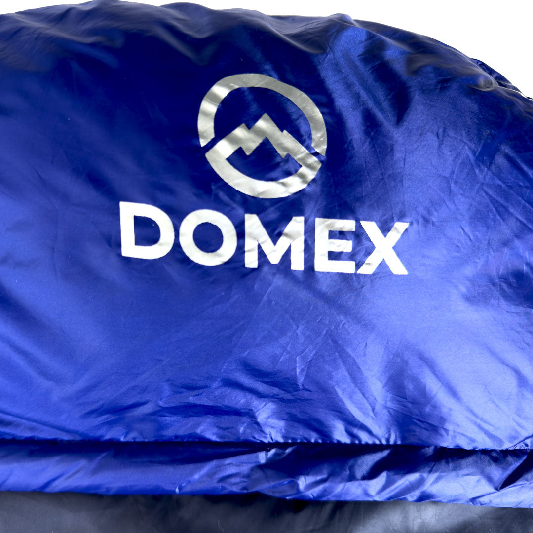 Close up of Domex logo on Trailblazer 500 XT 3-season down bag - blue