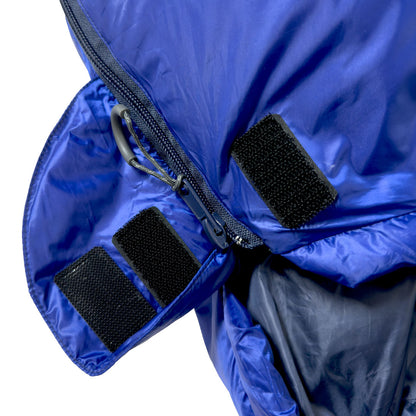 Close up of closure on Domex Trailblazer 500 XT 3-season down bag in open position (blue)