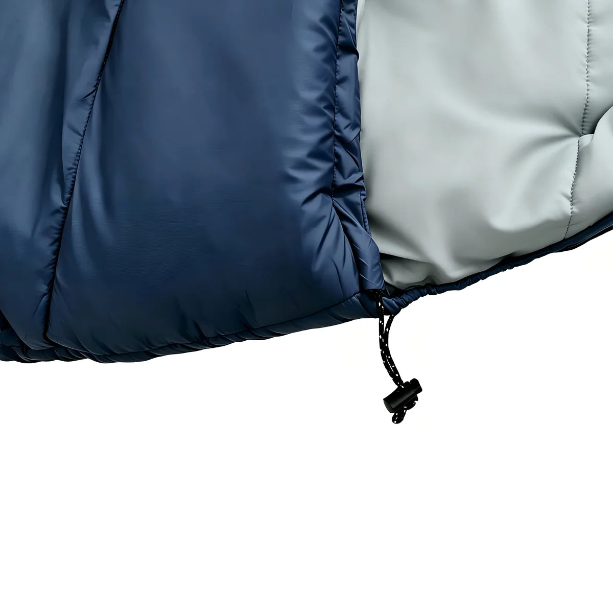 Detail view of Domex Stratus 300 drawcord with black toggle at the edge of the blue nylon ripstop outer and grey inner lining – Blue | DOM210